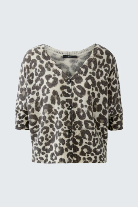 Leopard print cardigan: Soft knit with button closure, perfect for layering. No model, just the garment.