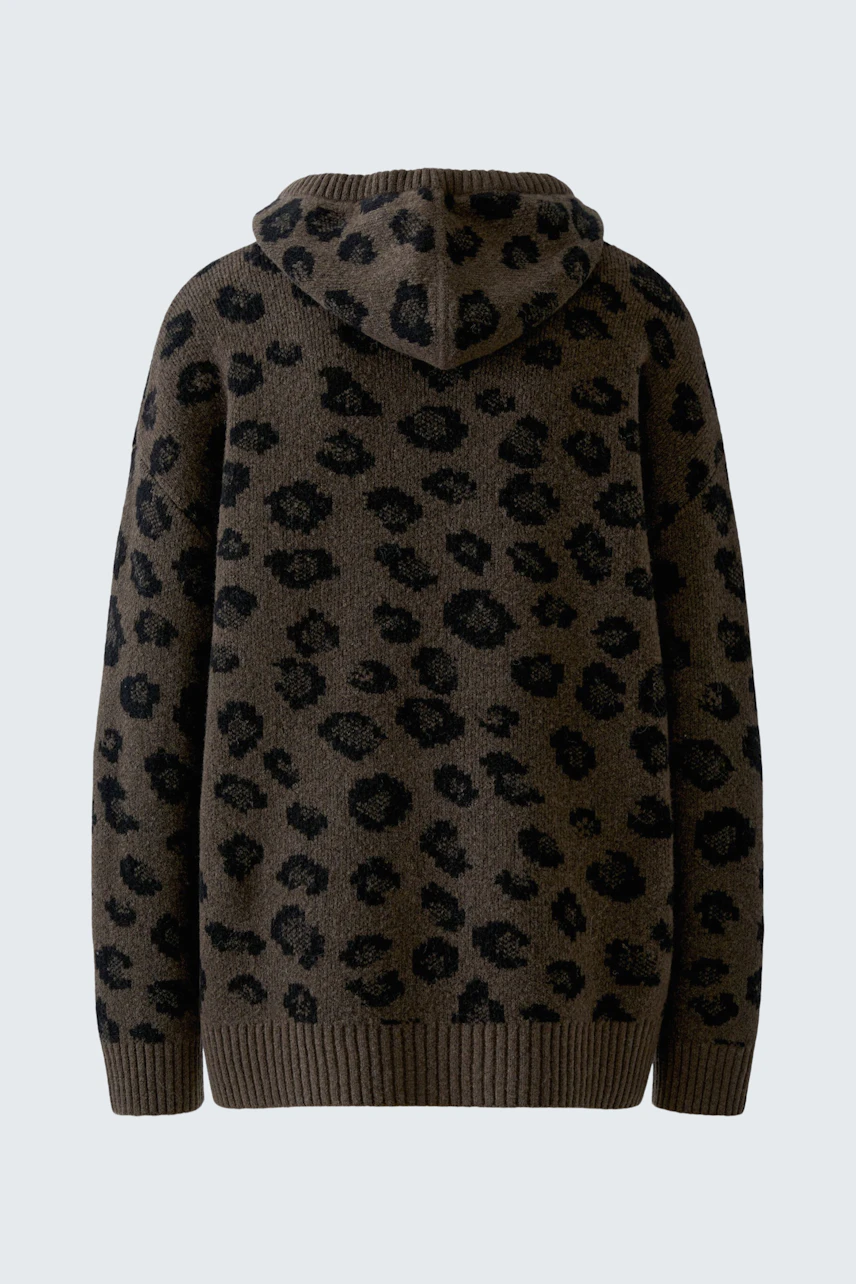 Leopard print pullover with hood, showcasing a bold pattern. No model, just the garment.