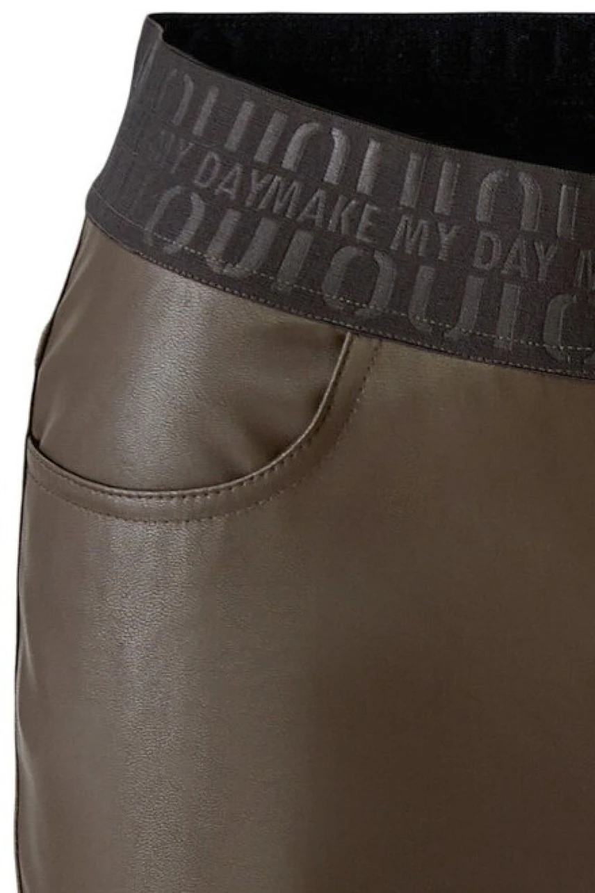 Brown faux leather pants with pocket detail and branded waistband, no model visible.