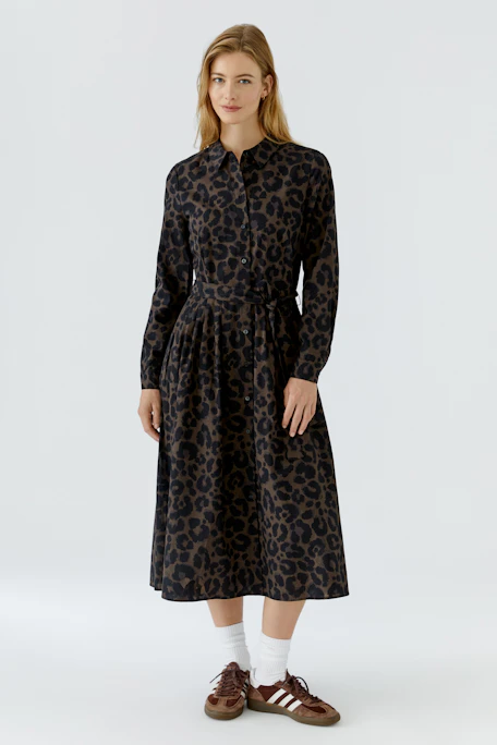 Leopard print midi dress: A stylish piece with long sleeves and a button-up front, perfect for any occasion.