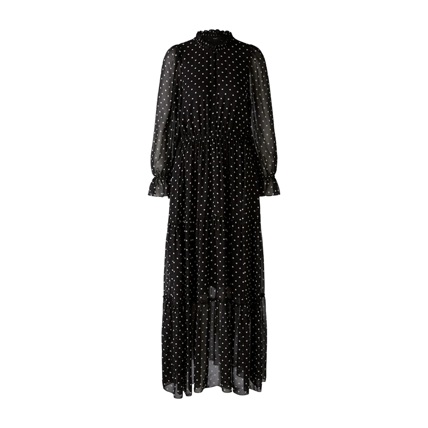 Elegantes Abendkleid: Schwarzes Maxikleid mit Punkten und langen, transparenten Ärmeln.