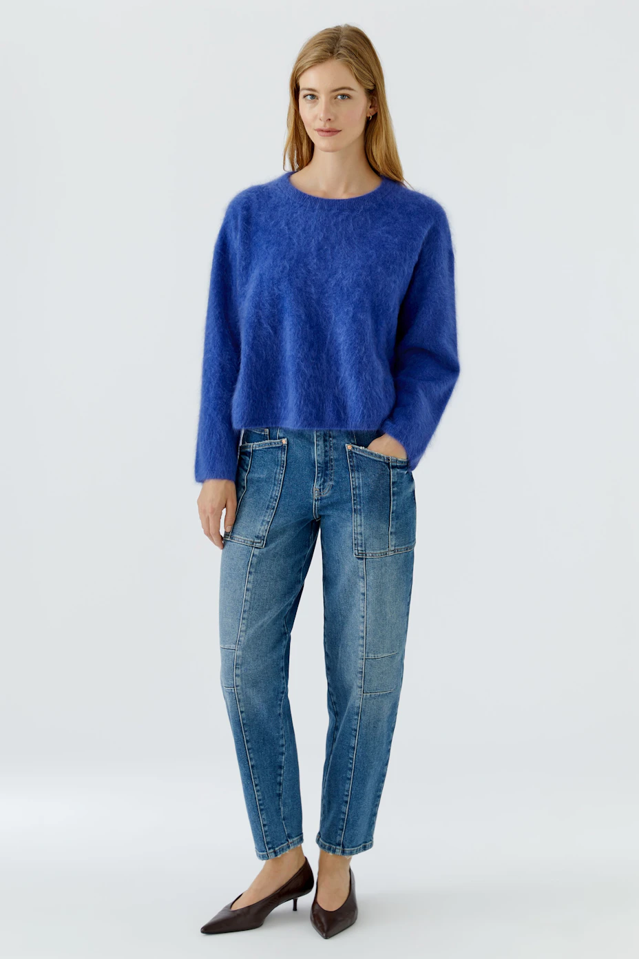 Bright blue pullover: Cozy and soft texture, perfect for casual wear. No model, just the pullover.
