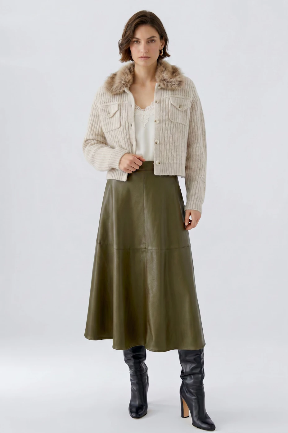 A-line skirt in olive green, flowing fabric, perfect for casual wear.