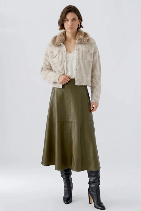 A-line skirt in olive green, flowing fabric, perfect for casual wear.