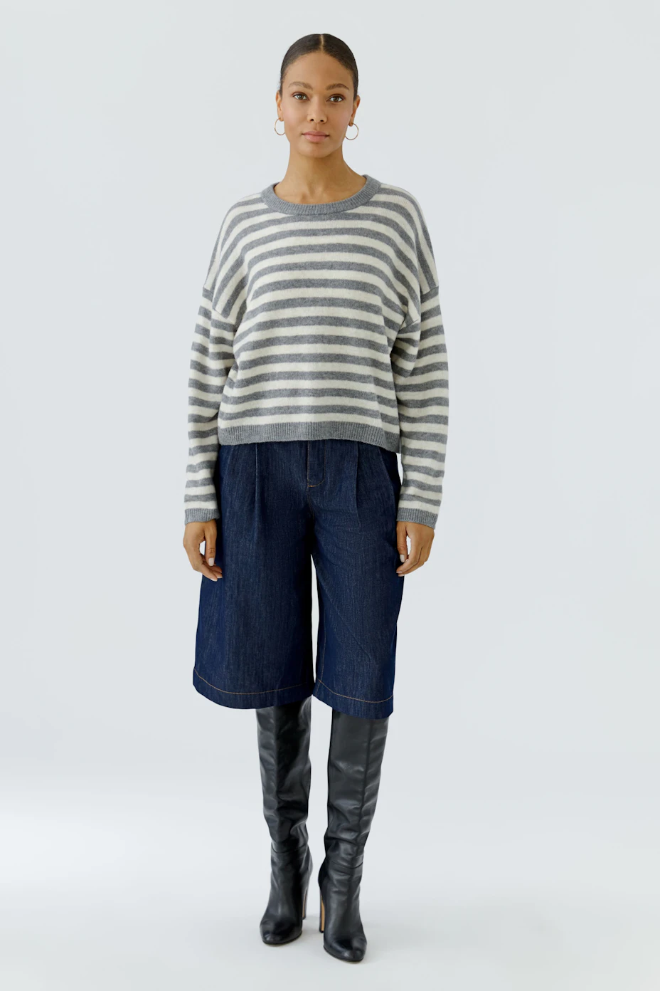 Casual striped pullover: Grey and white stripes, relaxed fit, perfect for everyday wear.