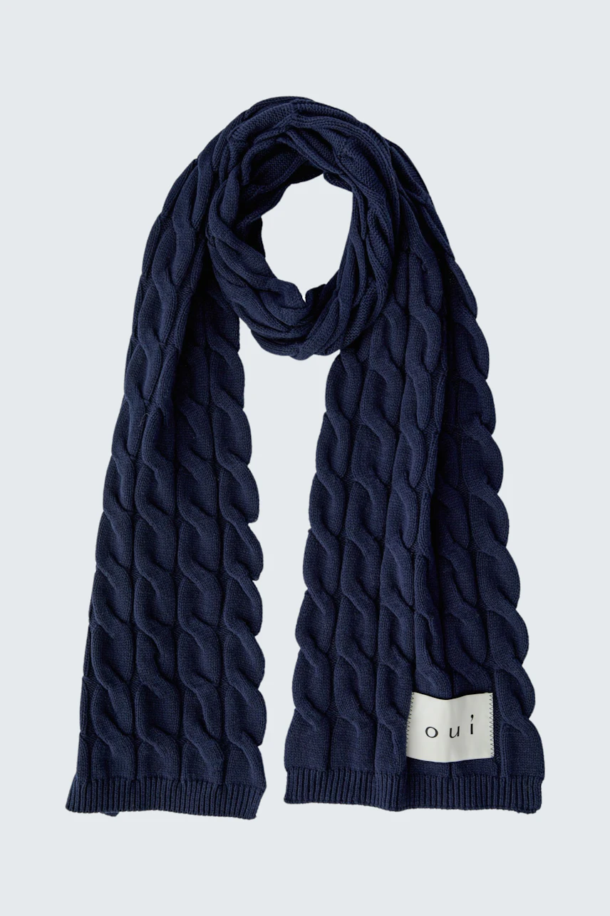 Cozy women's scarf in navy blue with a textured cable knit design.