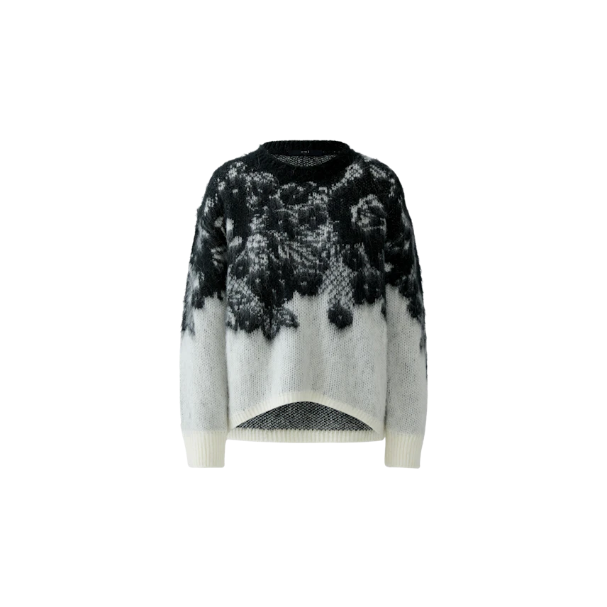 Casual women's pullover: Soft black and white knit with a unique pattern, perfect for everyday wear.