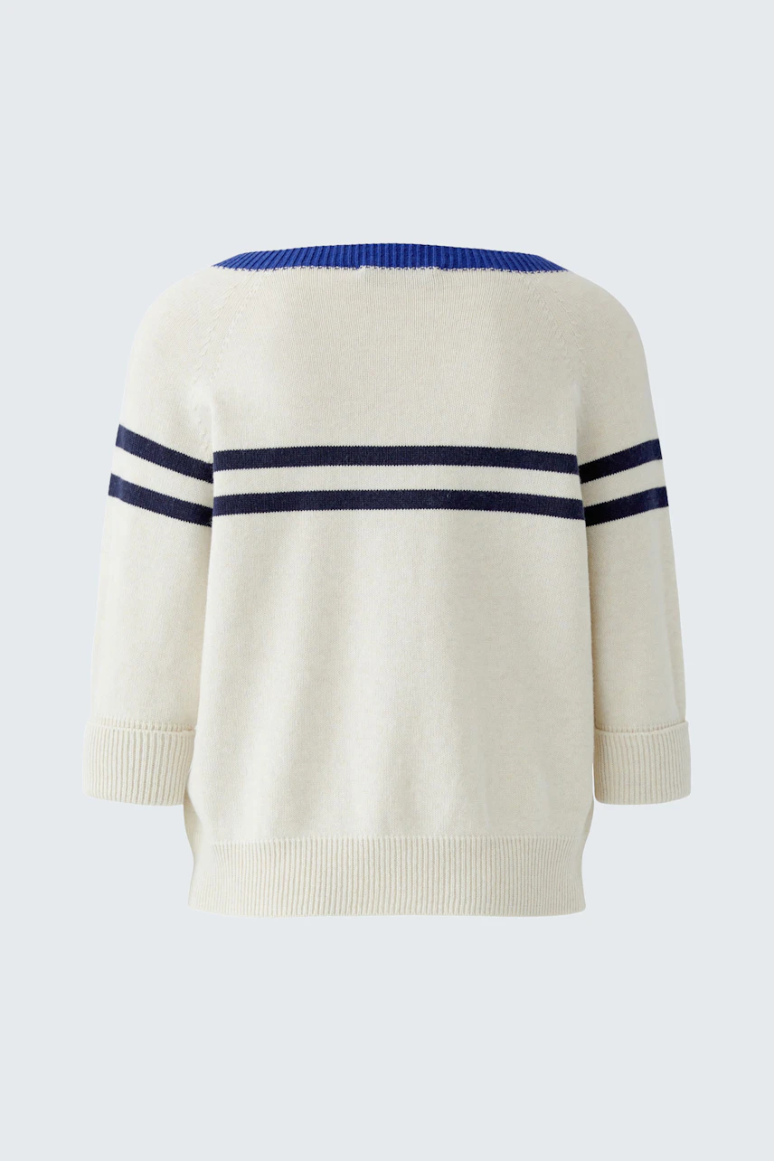 Casual women's pullover: Cream pullover with navy stripes, featuring a relaxed fit and wide neckline.