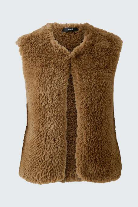 Cozy women's knit vest in brown faux fur, perfect for layering and adding texture to any outfit.