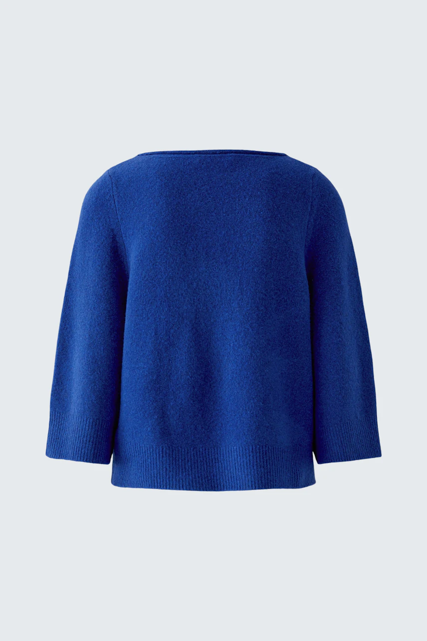 Casual blue pullover: Simple design with a relaxed fit, perfect for everyday wear.