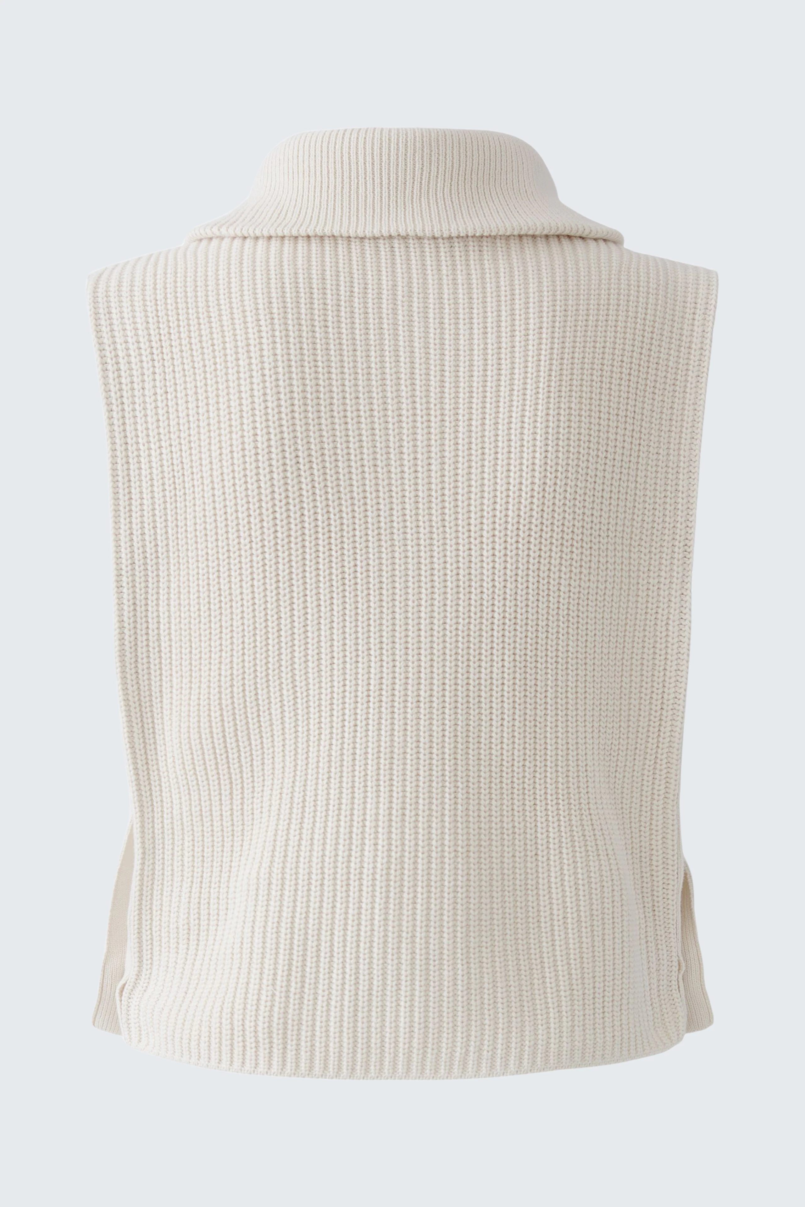 Casual women's pullunder in cream ribbed knit, shown without model, highlighting texture and style.