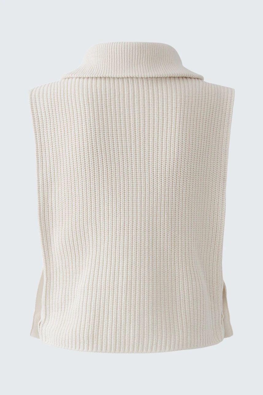 Casual women's pullunder in cream ribbed knit, shown without model, highlighting texture and style.