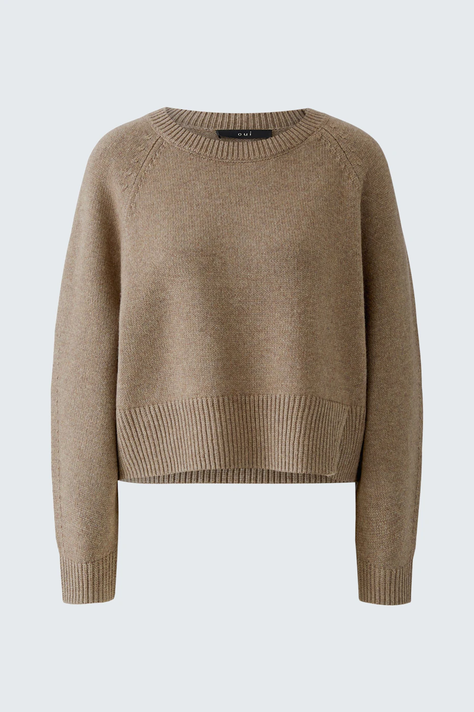 Casual pullover: A cozy, brown knit pullover with ribbed cuffs and hem, perfect for everyday wear.