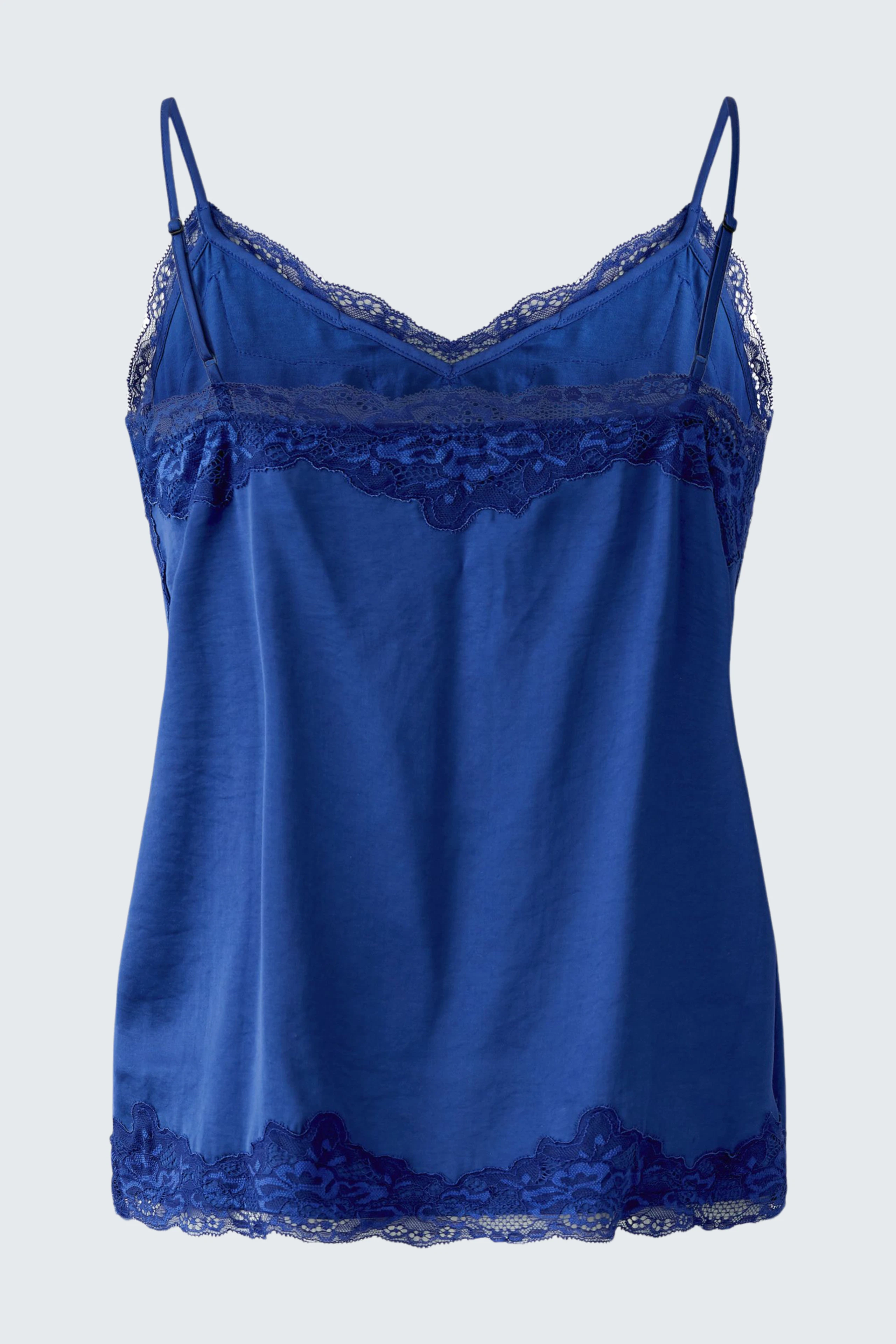 Blue lace-trimmed top: Sleeveless design with delicate lace details, perfect for layering or wearing alone.