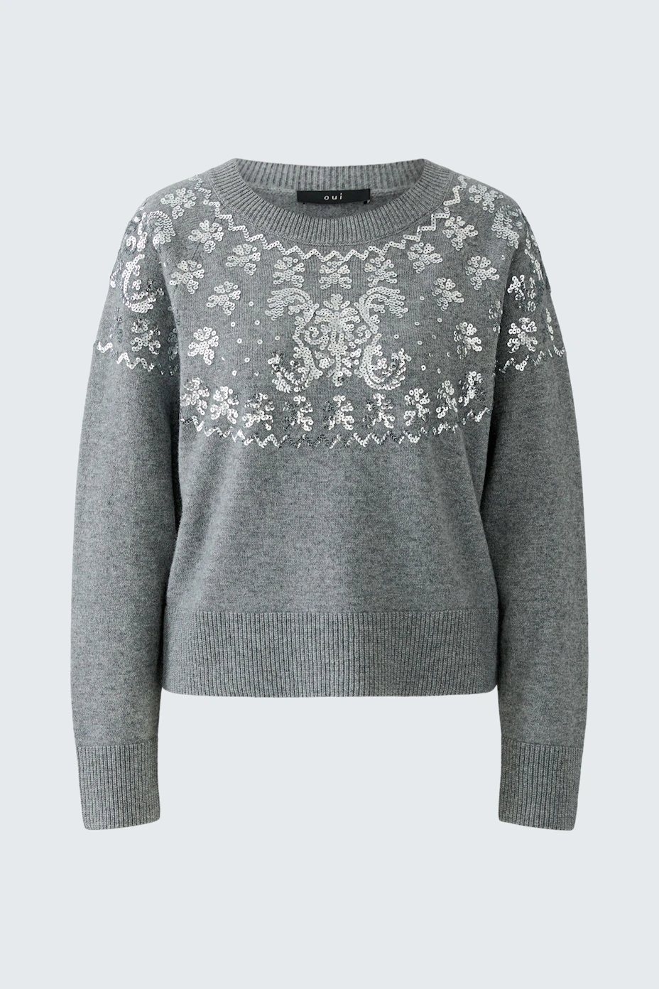 Cozy grey pullover with white patterns, perfect for casual wear. No model, just the pullover displayed.