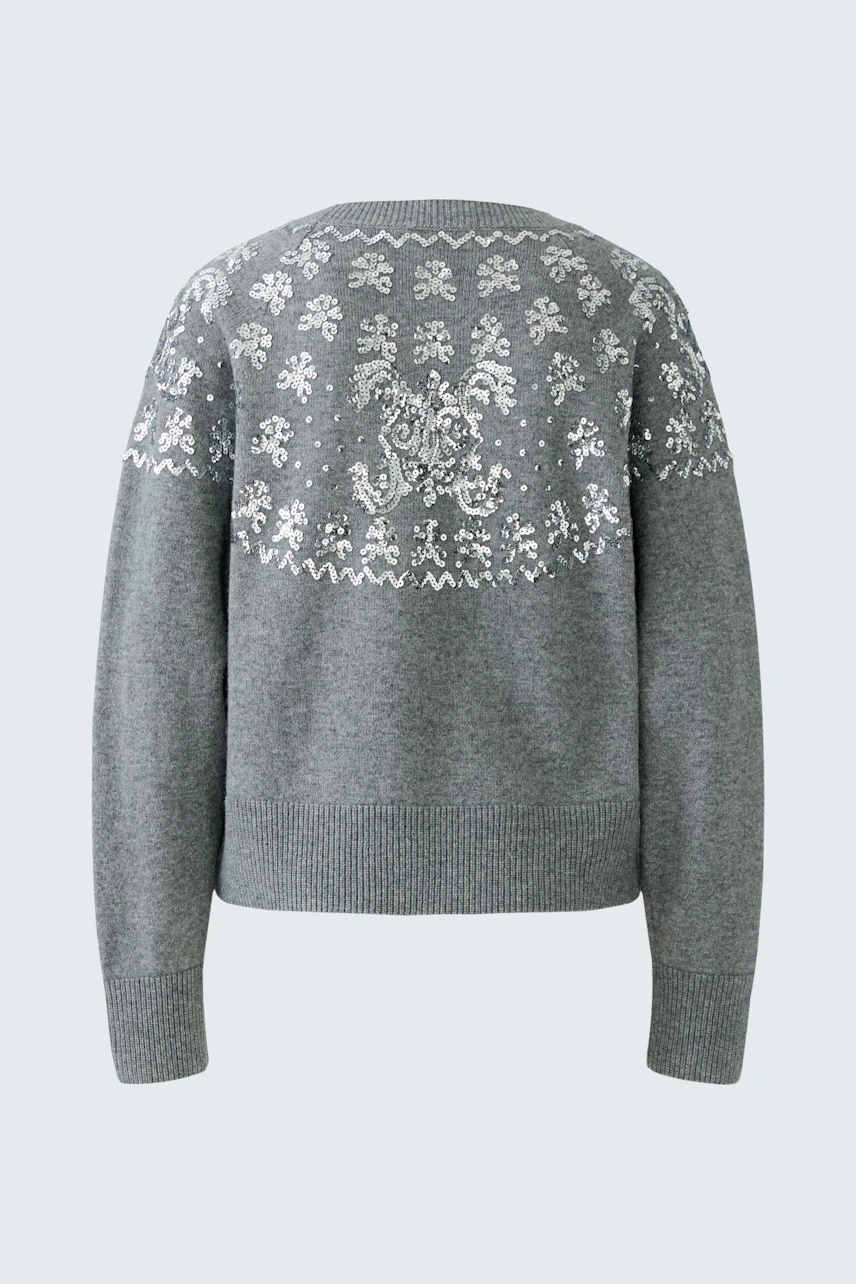 Grauer Damen-Pullover mit weißem Muster auf der Rückseite, ohne Model abgebildet.