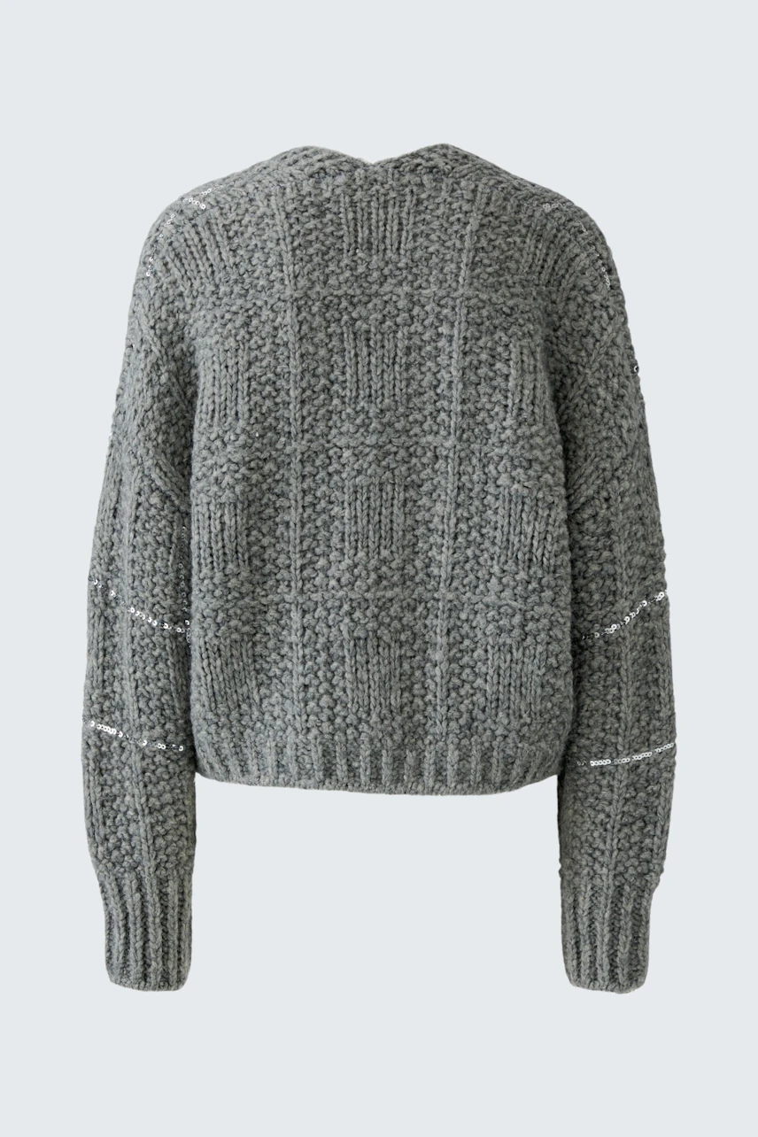 Cozy women's cardigan: Grey knit cardigan with textured pattern, perfect for layering in cooler weather.
