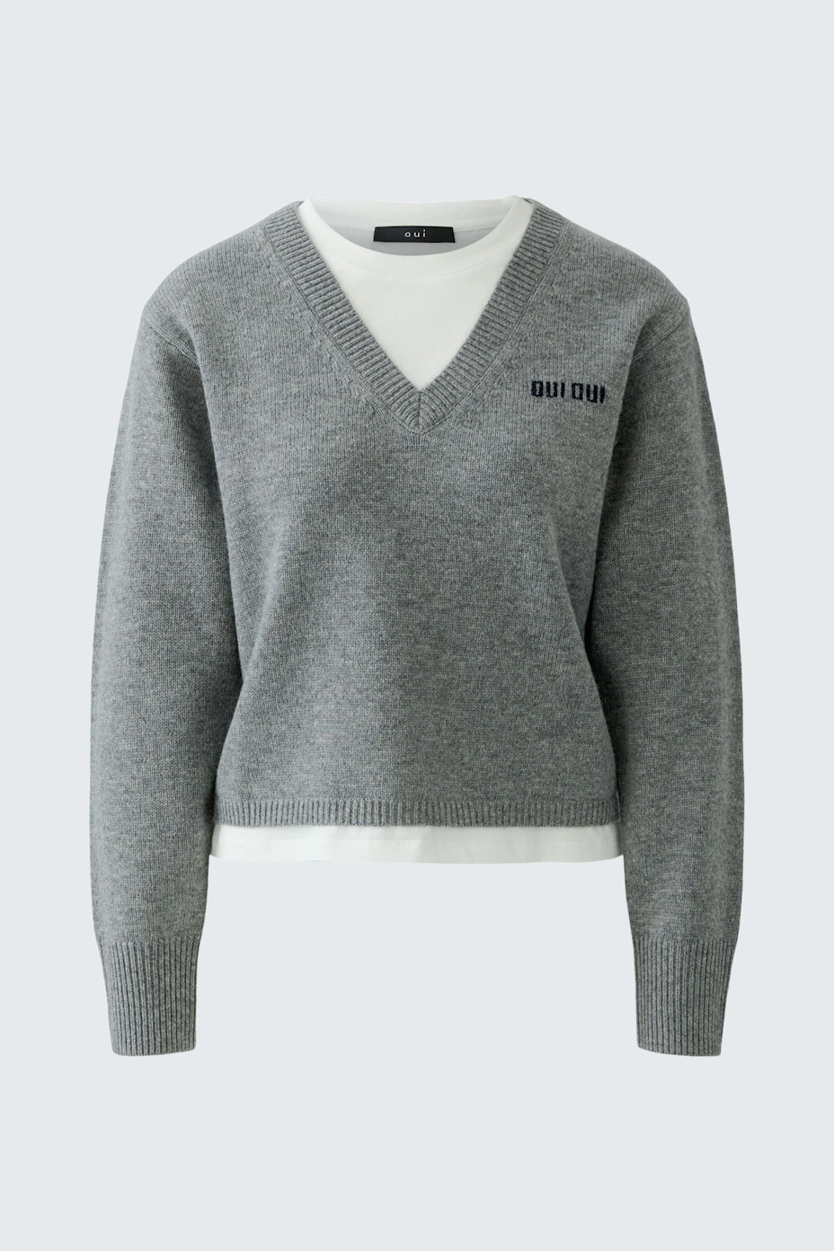 Casual women's pullover: Grey V-neck pullover with white layer detail, perfect for a relaxed look.