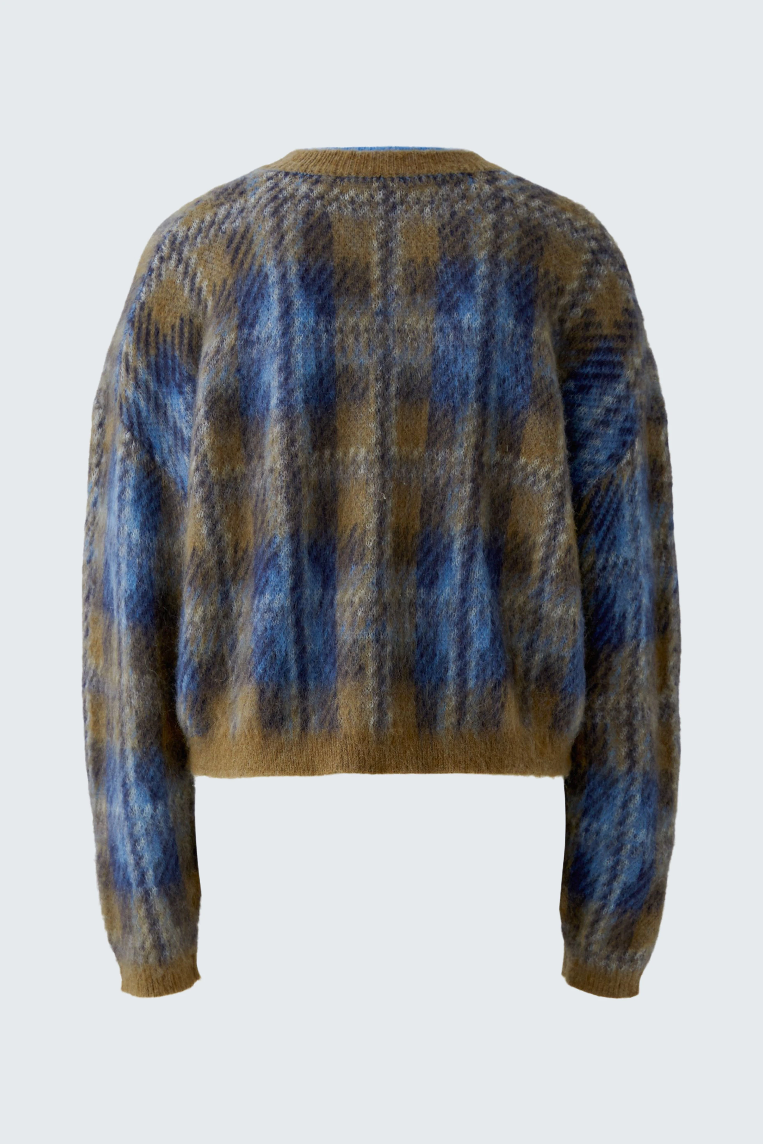 Cozy women's pullover in blue and brown plaid pattern, perfect for casual wear.
