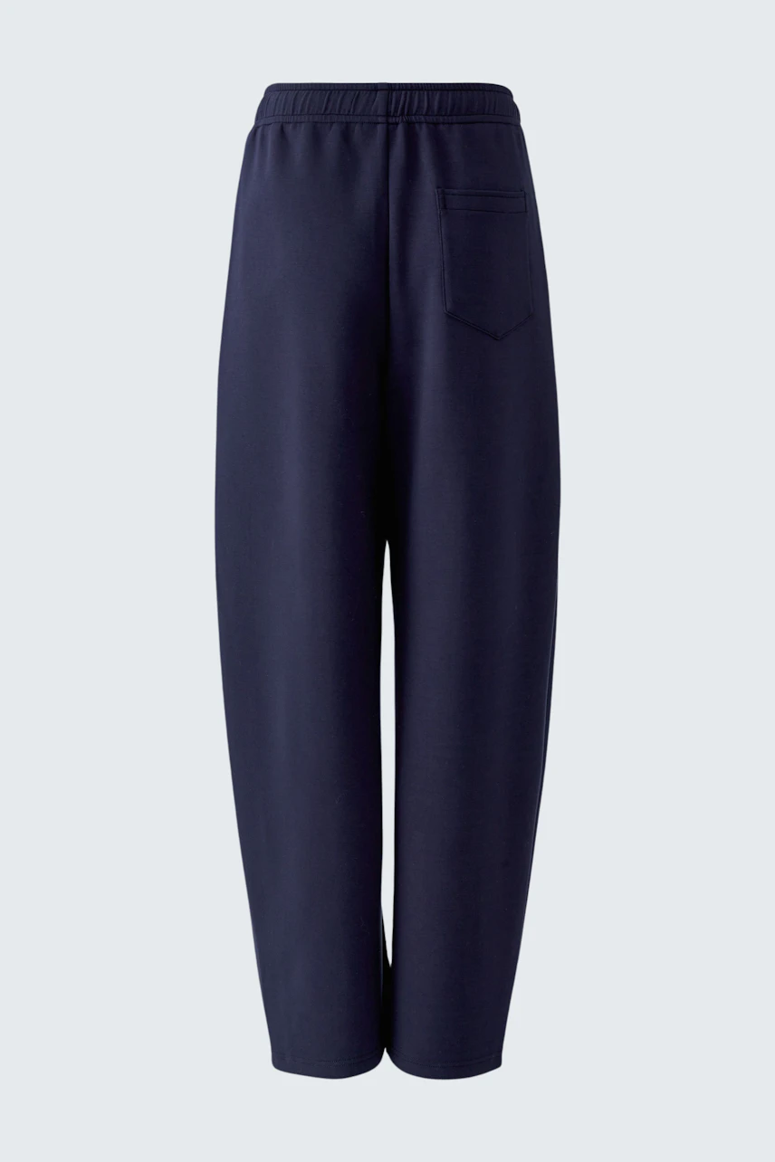 Casual women's pants: Navy blue pants with elastic waistband and relaxed fit, no model shown.