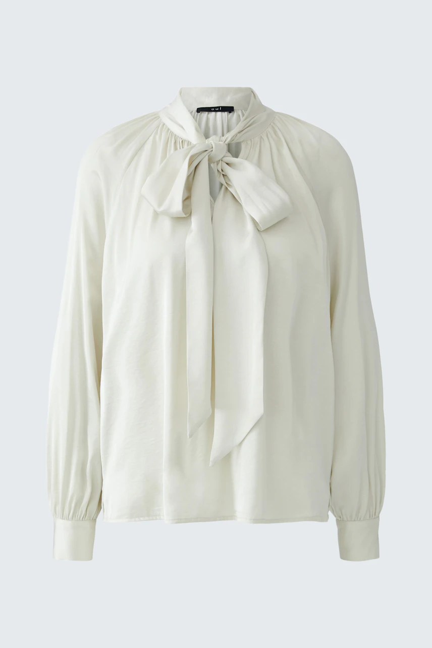 White pussy-bow blouse: Classic design with long sleeves and a stylish bow tie at the neck.