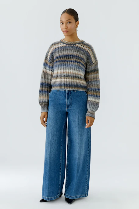 Wide leg jeans: Blue denim with high waist and relaxed fit, perfect for casual style.