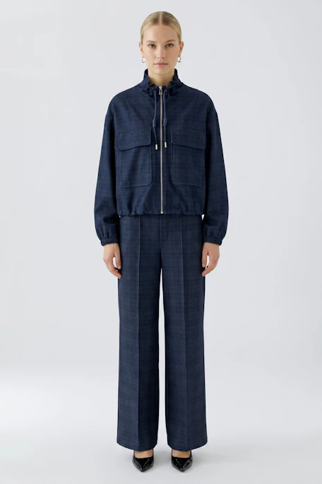 Casual women's jacket: Navy blue zip-up jacket with large front pockets and a high collar.