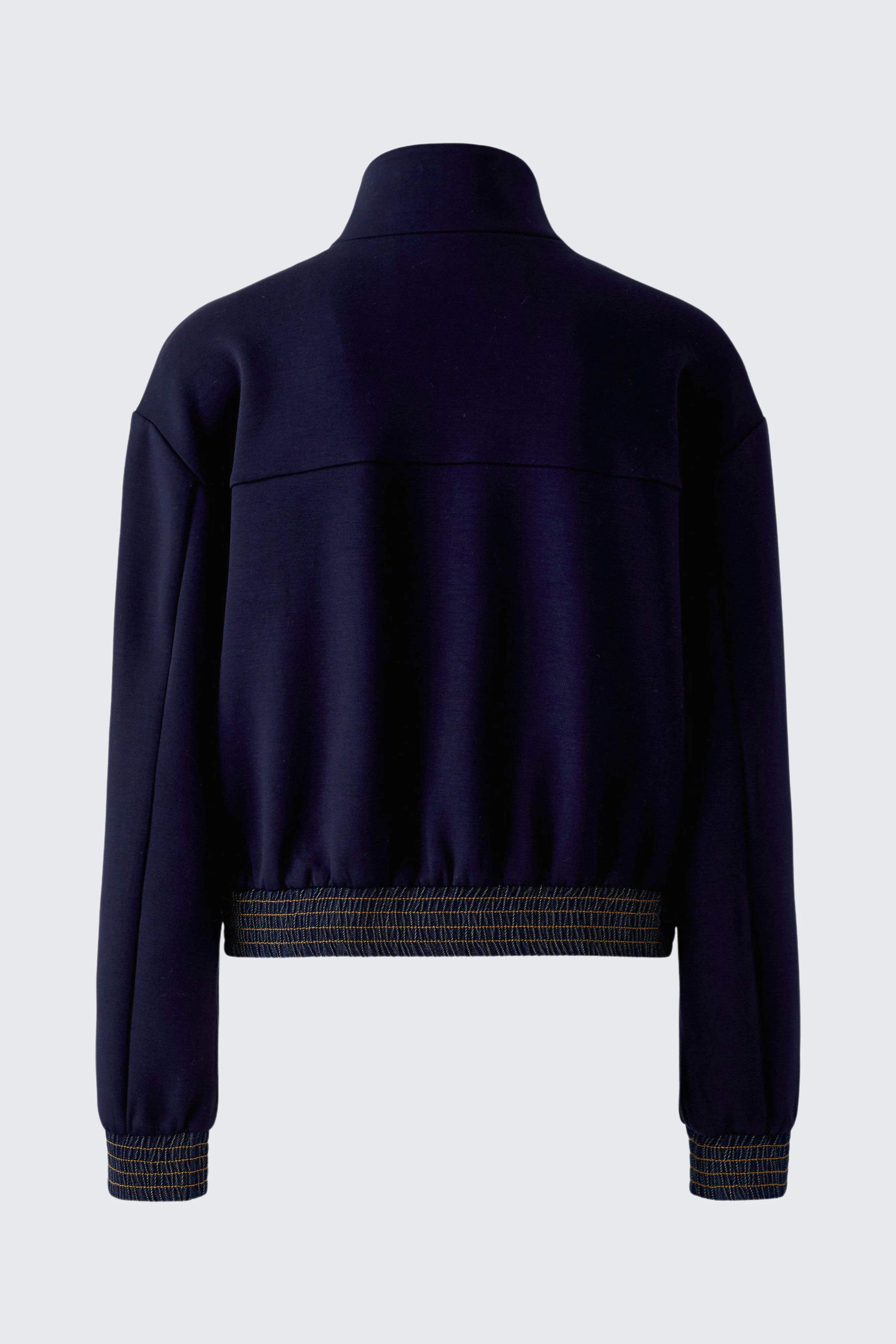 Navy blouson jacket: Back view of a casual women's blouson with ribbed hem and collar.