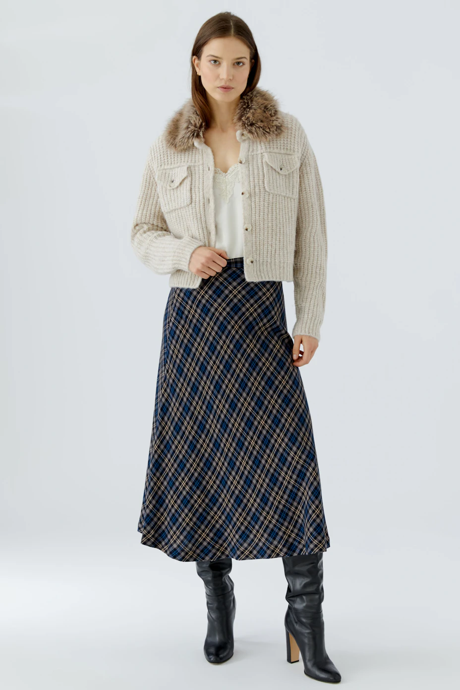 A-line skirt in plaid pattern, showcasing a classic design with a comfortable fit.