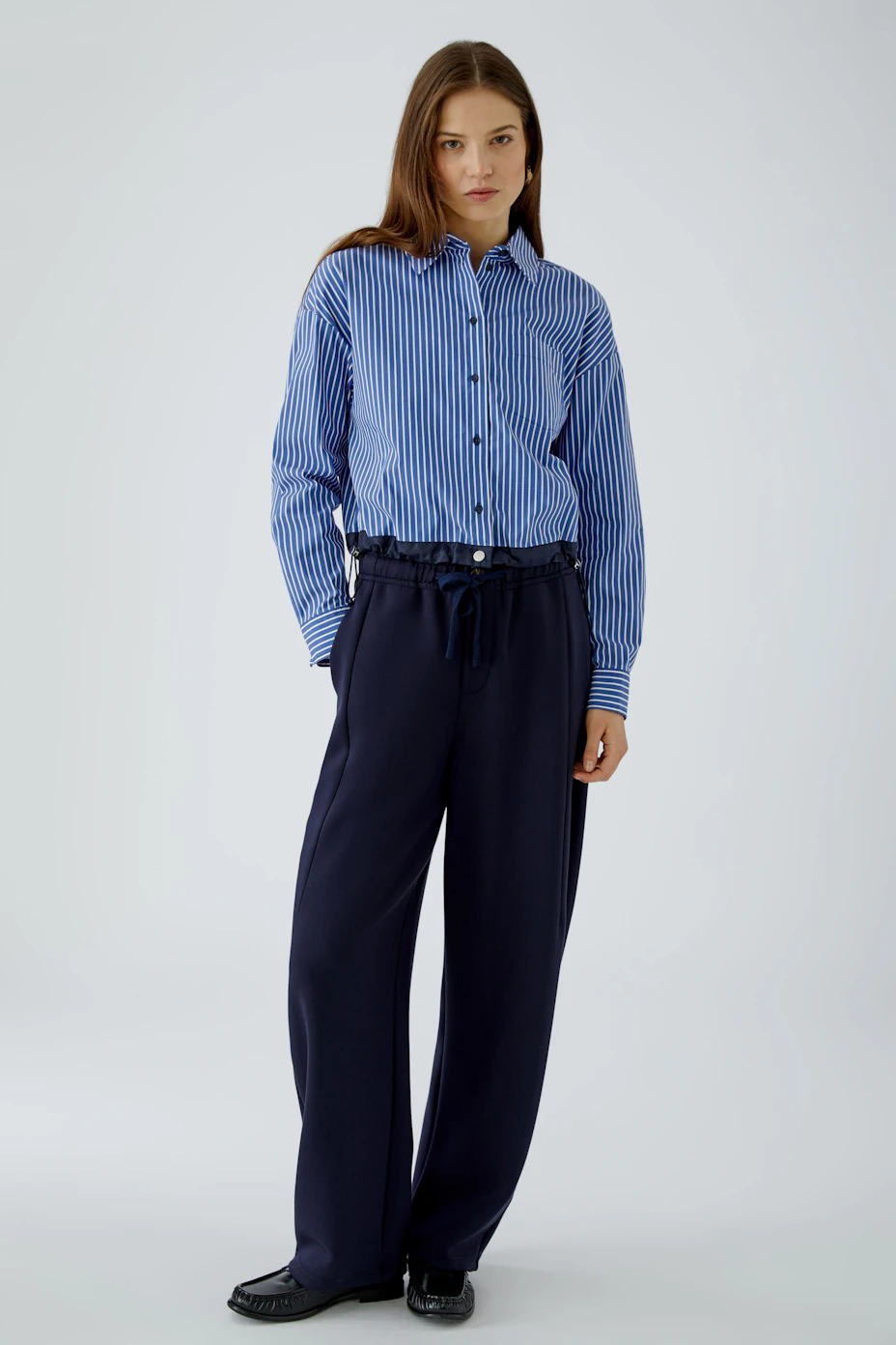 Striped shirt blouse: Blue and white striped blouse with button-up front, perfect for casual wear.