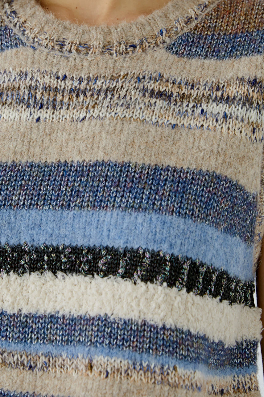 Striped pullover vest in earthy tones, close-up of knit texture. Casual and cozy for layering.