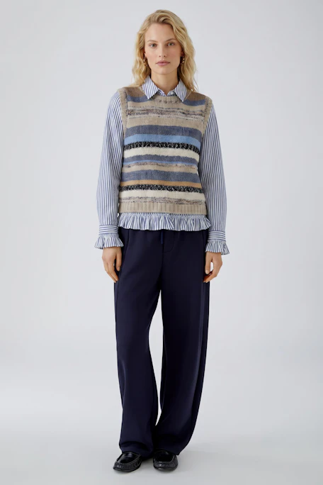 Striped pullover vest in earthy tones, no model. Casual and versatile for layering.