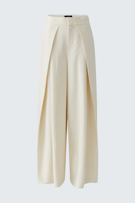 Pleated trousers: Cream-colored wide-leg pants with front pleats, no model visible.