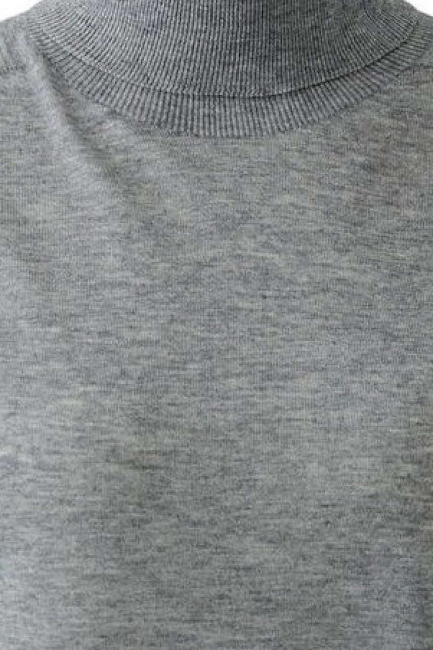 Casual grey pullover: Simple design with a high neckline, perfect for layering in cooler weather.