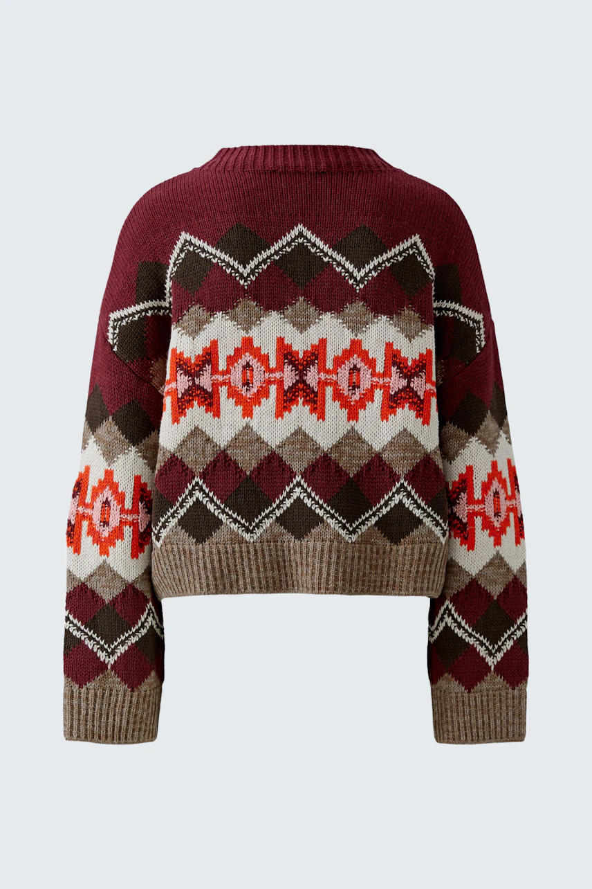 Gemusterter Damen-Pullover: Bunter Strickpullover mit geometrischen Mustern in Rot, Braun und Beige.