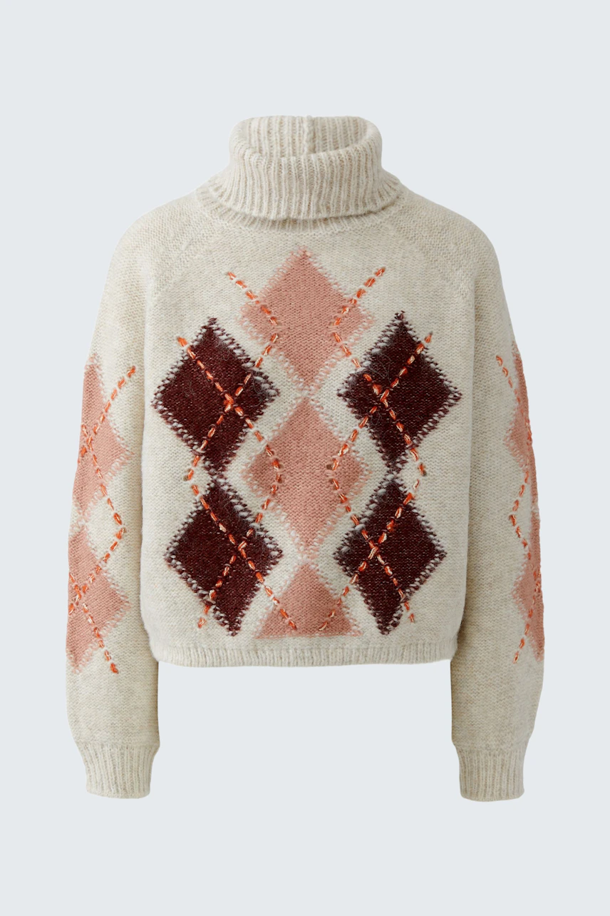 Gemusterter Damen-Pullover: Beiger Strickpullover mit Rautenmuster in Rot- und Rosatönen, Rollkragen.