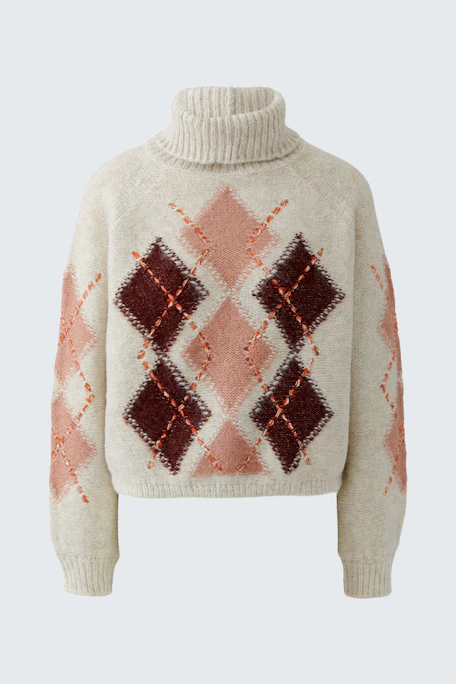 Cozy women's pullover: Cream turtleneck with bold argyle pattern in pink and burgundy tones.
