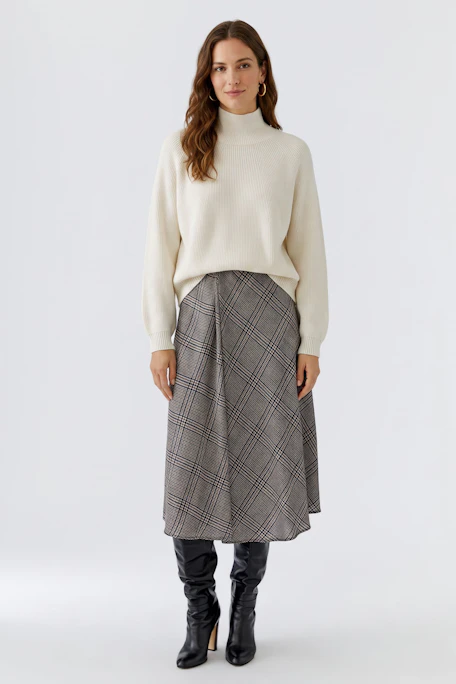 Casual A-line skirt in plaid pattern, perfect for versatile styling. No model, just the skirt.
