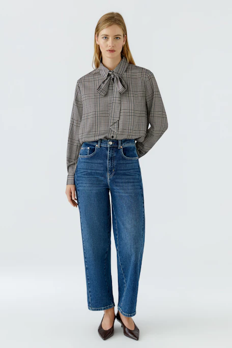 Plaid pussy-bow blouse: Classic check pattern with a stylish bow tie, perfect for versatile styling.
