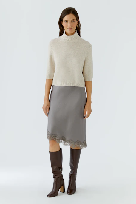 Grey pencil skirt with lace hem, perfect for versatile styling. No model, just the skirt.