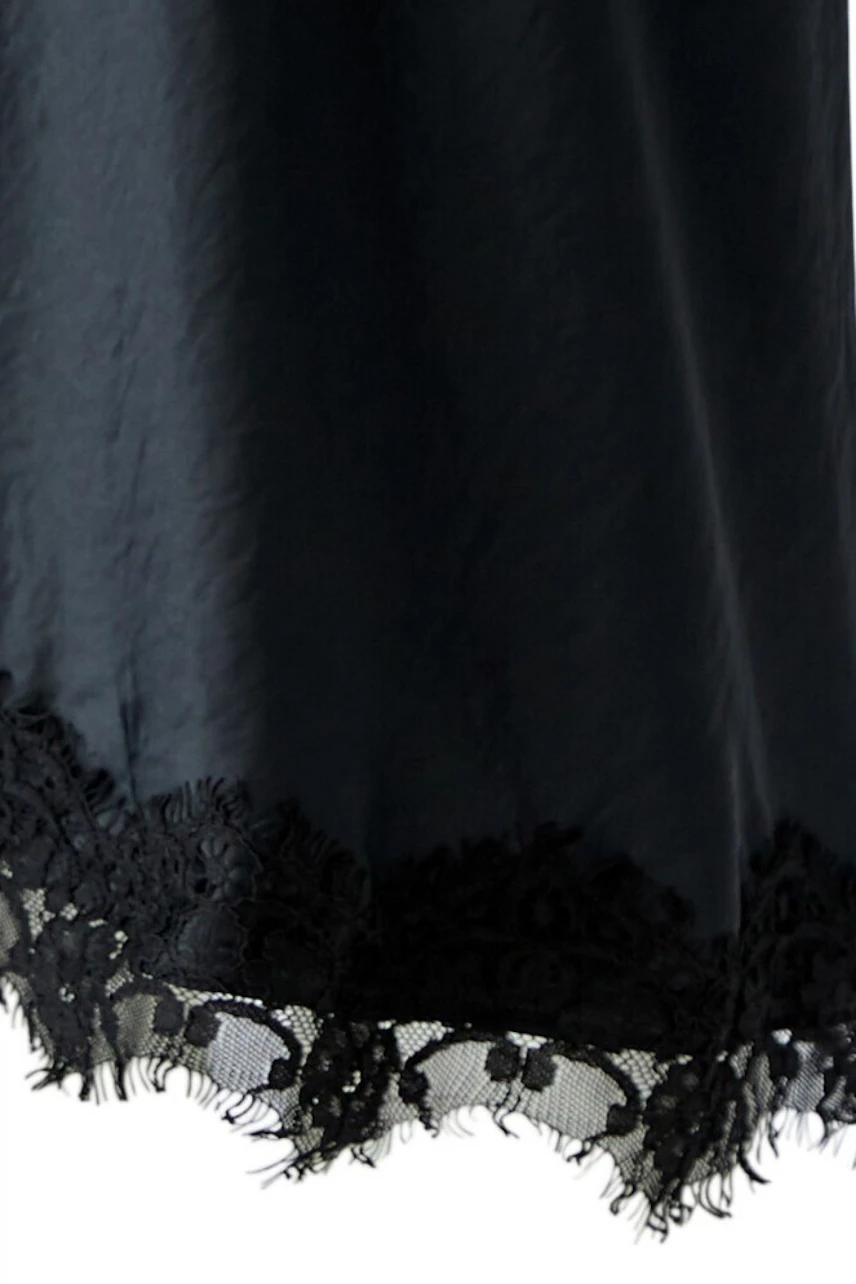 Black pencil skirt with lace hem detail, perfect for versatile styling.