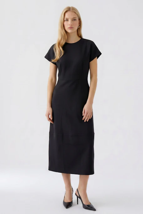 Simple black dress: A classic, sleeveless design with a fitted waist and flowing skirt.