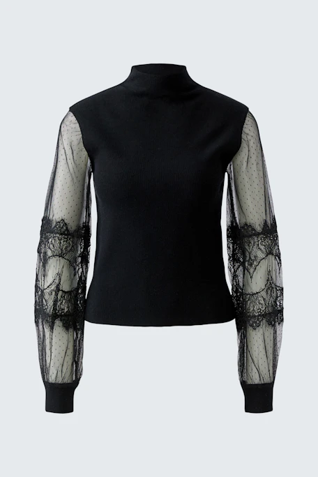 Black pullover with sheer lace sleeves, no model visible.