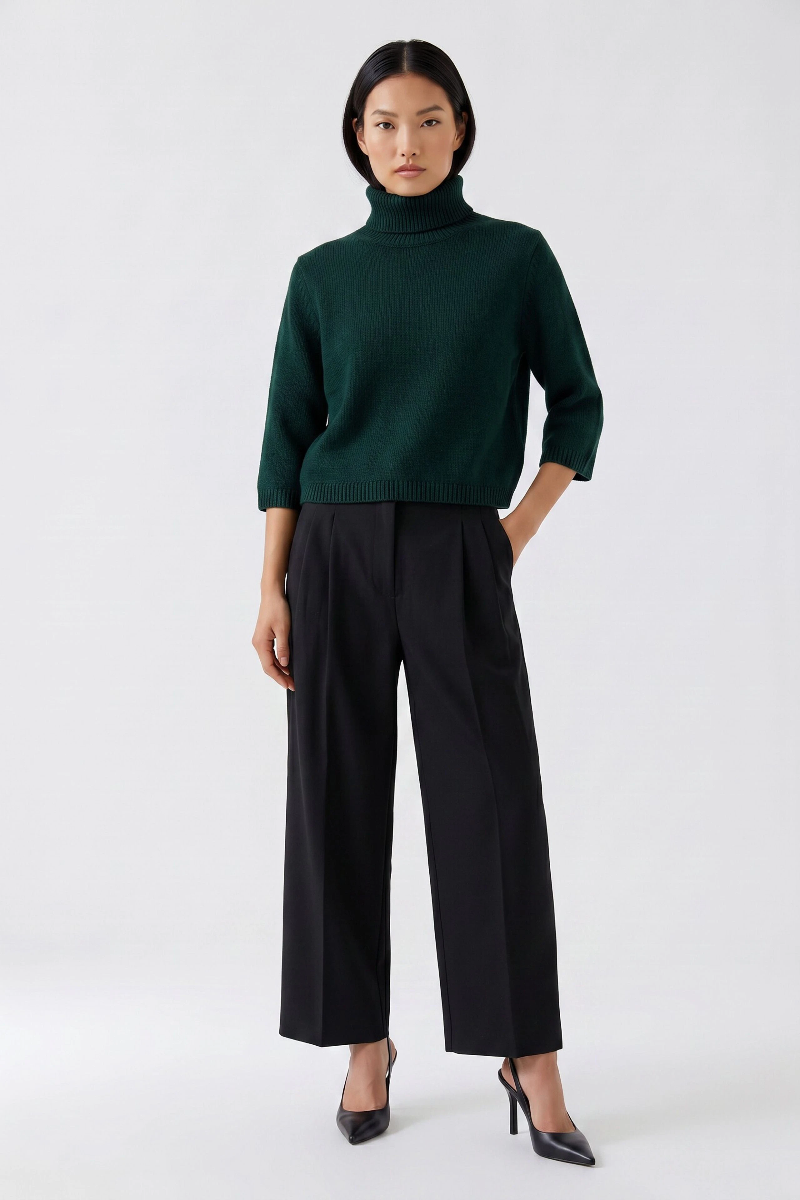 Black pleated trousers: Classic design with wide legs, perfect for versatile styling.
