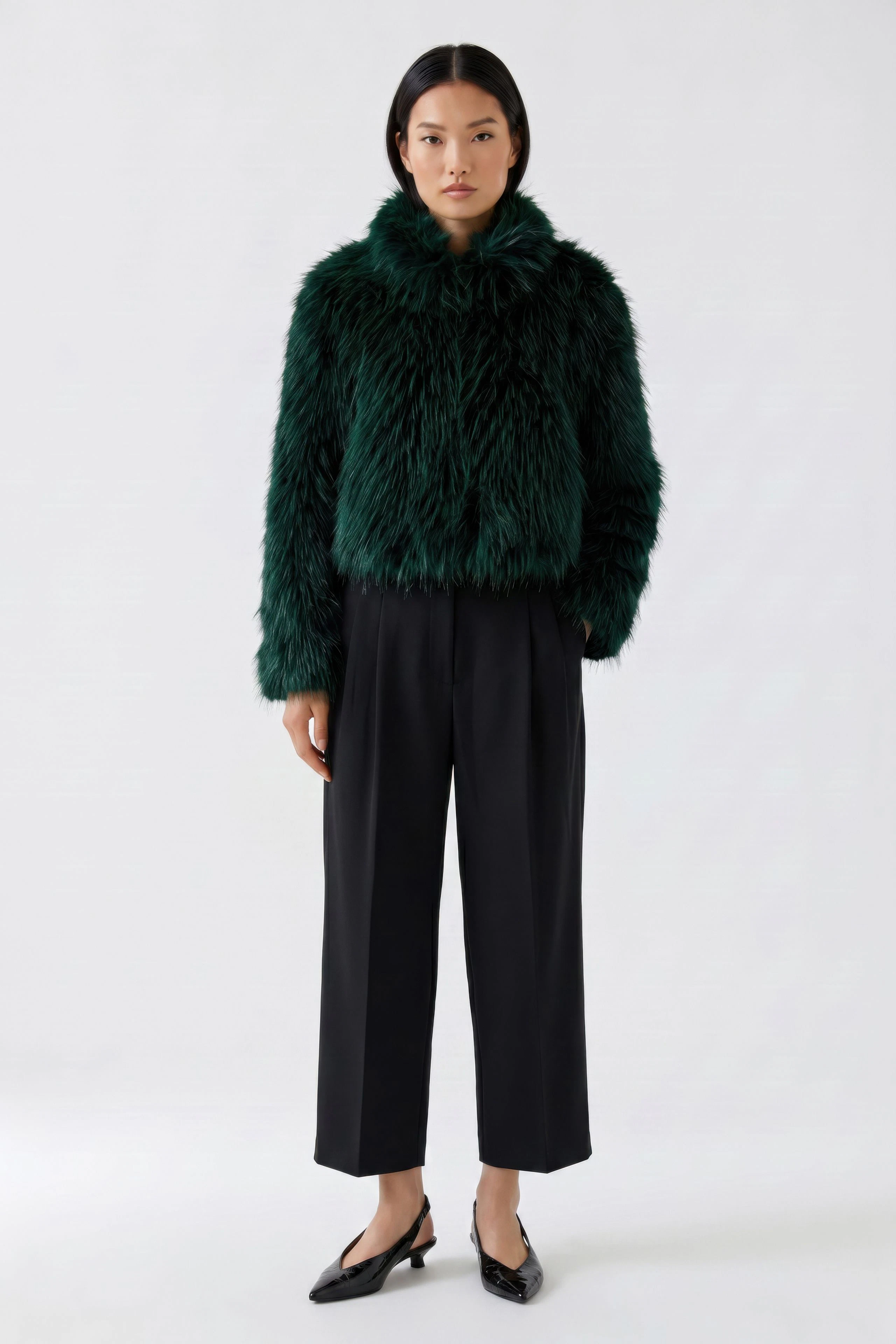 Green faux fur jacket: Fluffy texture, perfect for a bold, cozy look. No model, just the jacket.