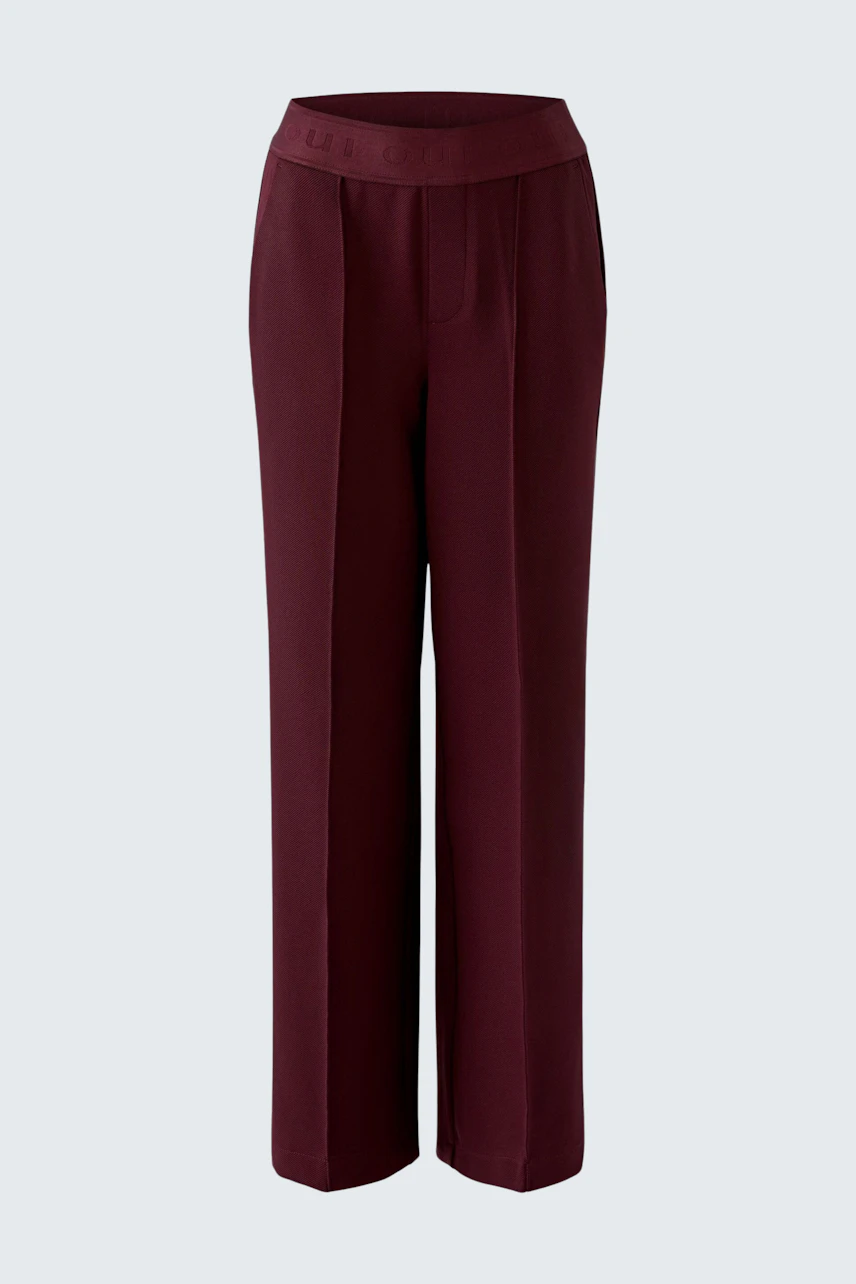 Women's pants: Burgundy wide-leg pants with a high waist, perfect for a chic and comfortable look.