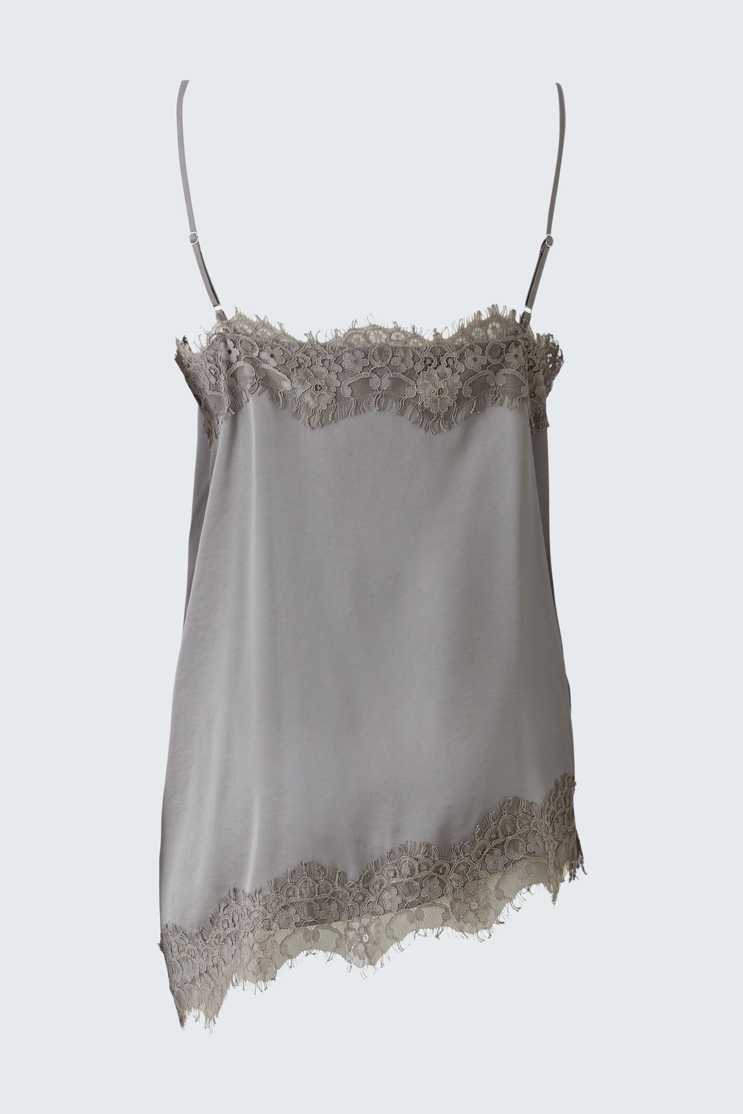 Women's top with lace trim, featuring thin straps and a soft, flowing fabric.