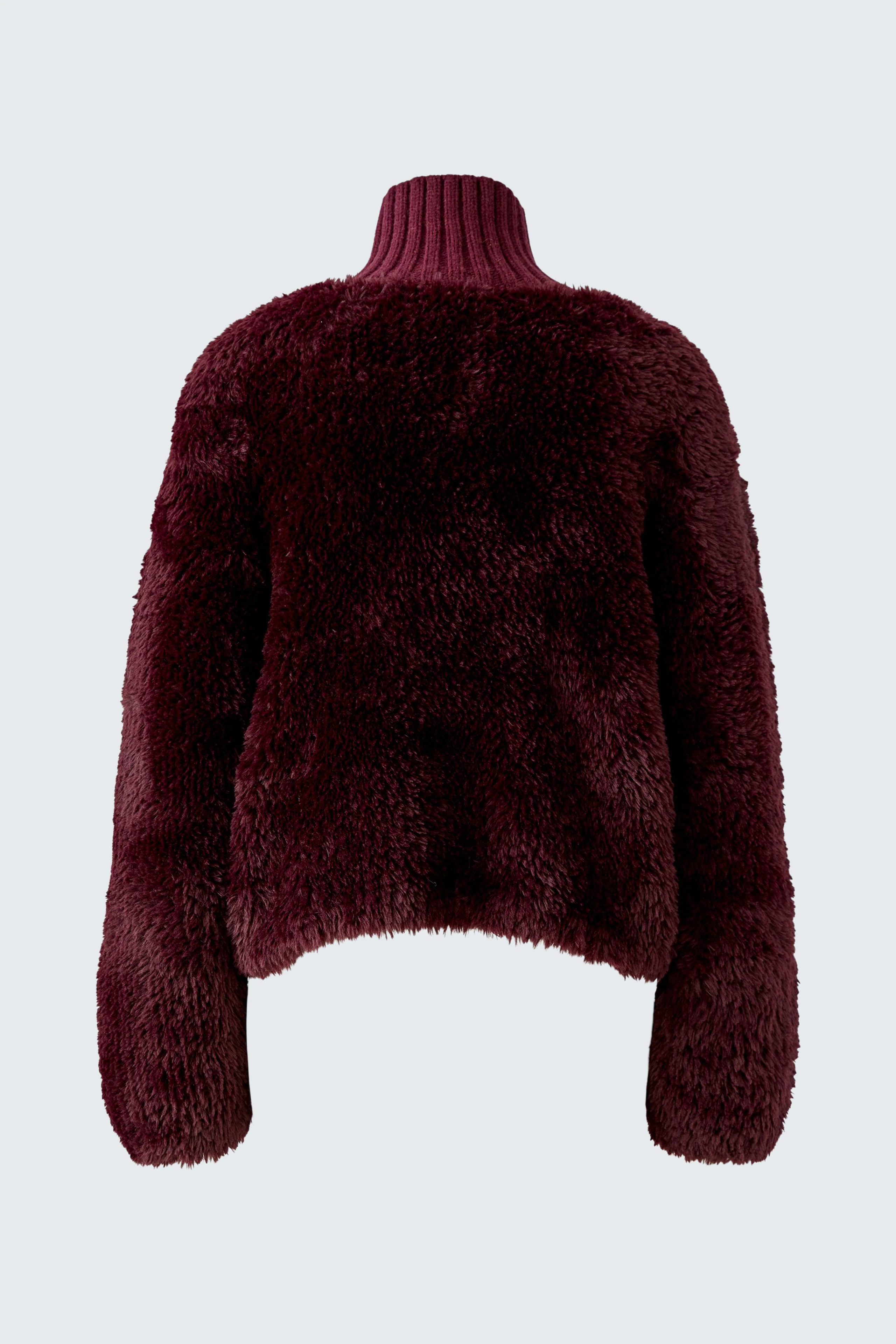 Cozy women's cardigan in rich burgundy, featuring a plush texture and high collar for warmth.