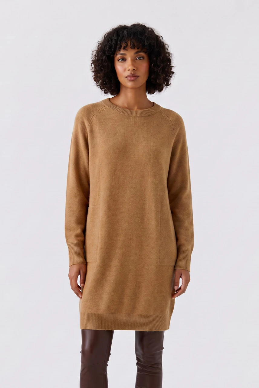 Casual knit dress: Woman in a brown knit dress with long sleeves, standing confidently.