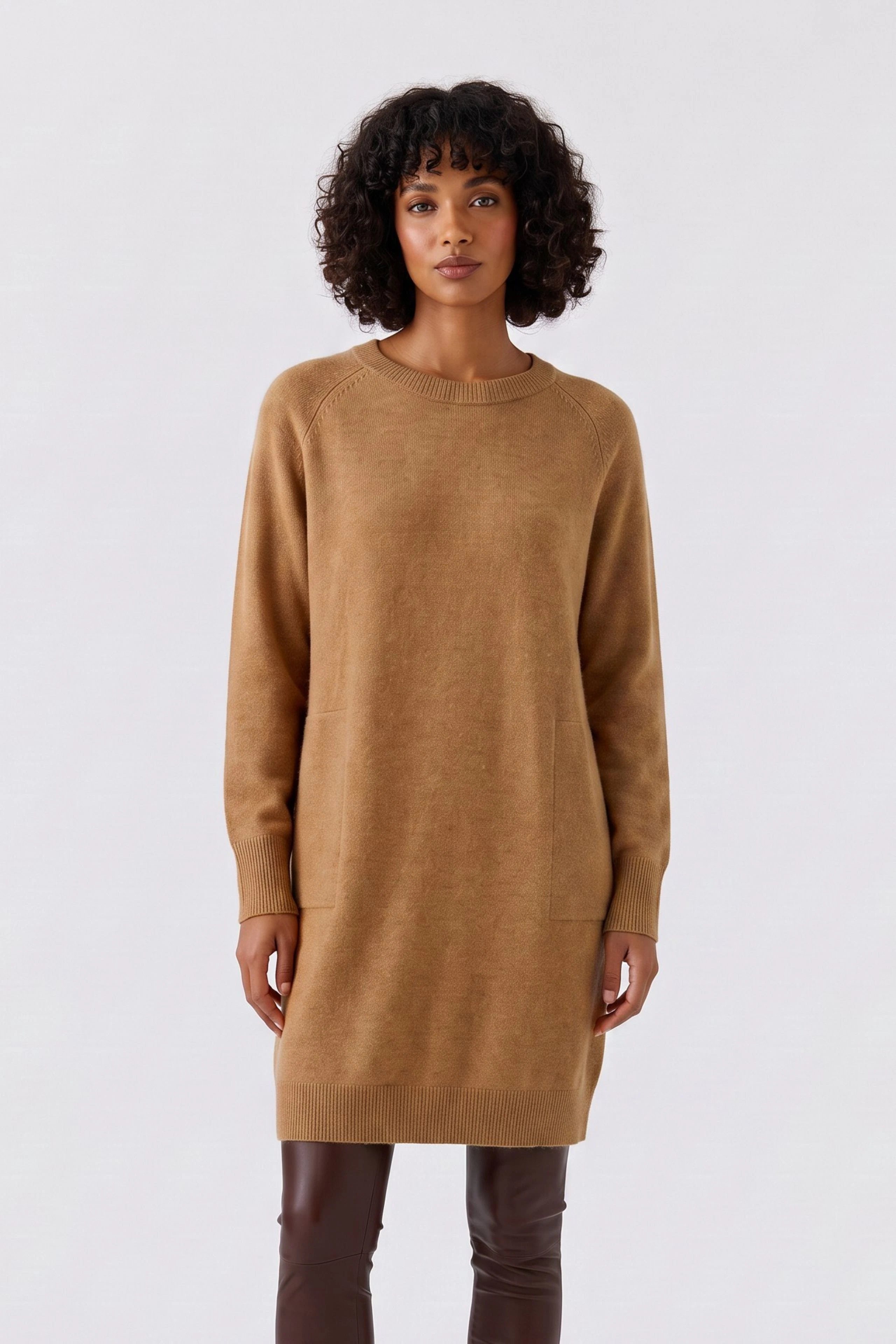 Casual knit dress: Simple brown knit dress with long sleeves, perfect for a relaxed look.